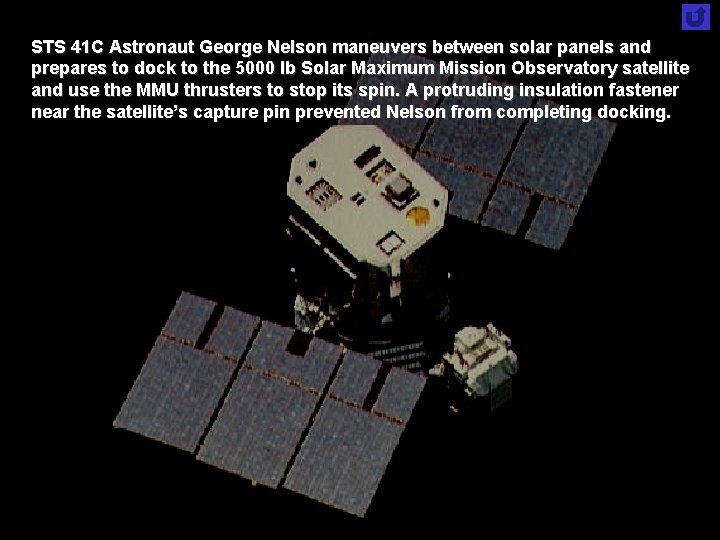STS 41 C Astronaut George Nelson maneuvers between solar panels and prepares to dock STS 41 C Astronaut George Nelson maneuvers between solar panels and prepares to dock