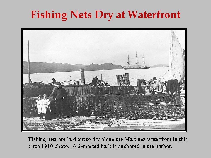 Fishing Nets Dry at Waterfront Fishing nets are laid out to dry along the