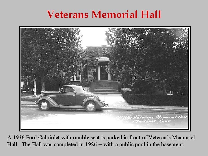 Veterans Memorial Hall A 1936 Ford Cabriolet with rumble seat is parked in front