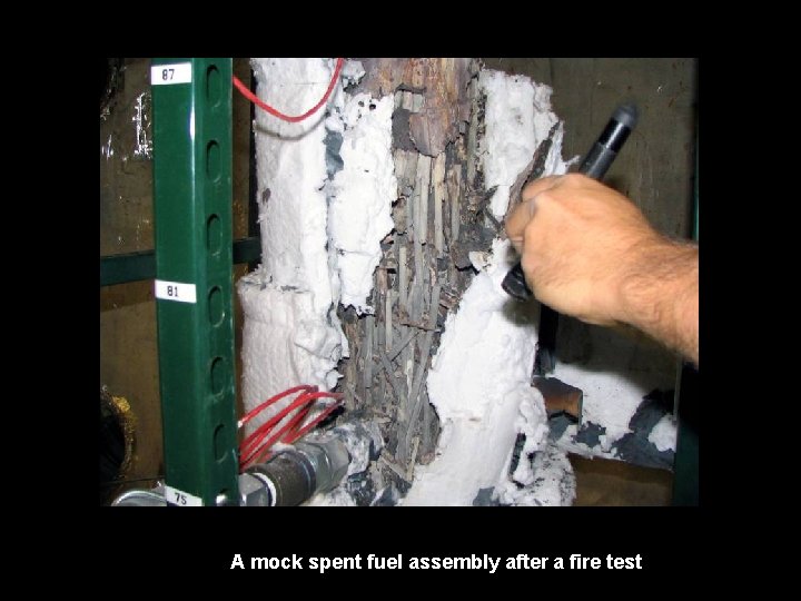 A mock spent fuel assembly after a fire test A mock spent fuel assembly after a fire test