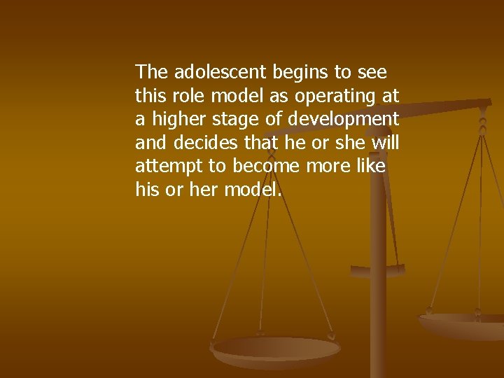 The adolescent begins to see this role model as operating at a higher stage