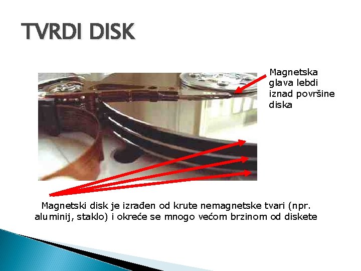 TVRDI DISK Magnetska glava lebdi iznad površine diska Magnetski disk je izrađen od krute TVRDI DISK Magnetska glava lebdi iznad površine diska Magnetski disk je izrađen od krute