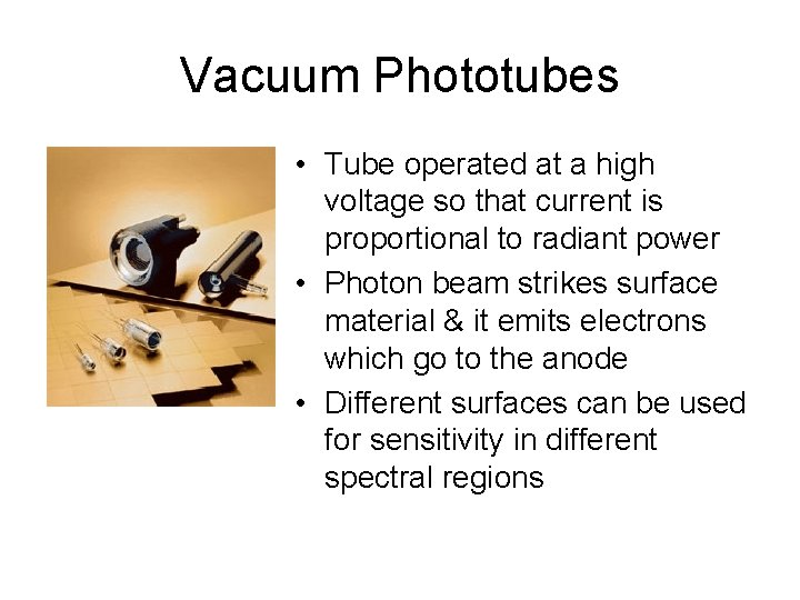 Vacuum Phototubes • Tube operated at a high voltage so that current is proportional