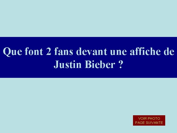 Que font 2 fans devant une affiche de Justin Bieber ? VOIR PHOTO PAGE