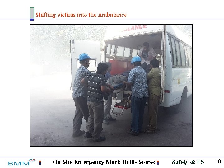Shifting victims into the Ambulance On Site Emergency Mock Drill- Stores Safety & FS