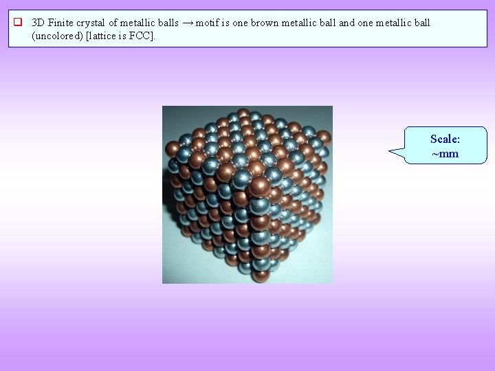 q 3 D Finite crystal of metallic balls → motif is one brown metallic