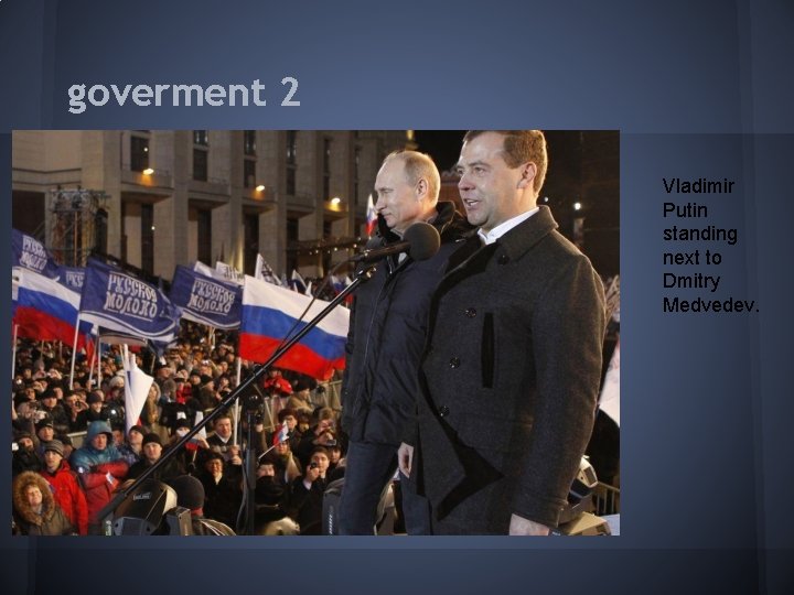 goverment 2 Vladimir Putin standing next to Dmitry Medvedev. 