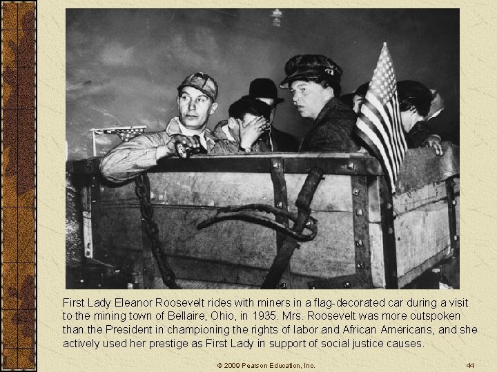 First Lady Eleanor Roosevelt rides with miners in a flag-decorated car during a visit First Lady Eleanor Roosevelt rides with miners in a flag-decorated car during a visit