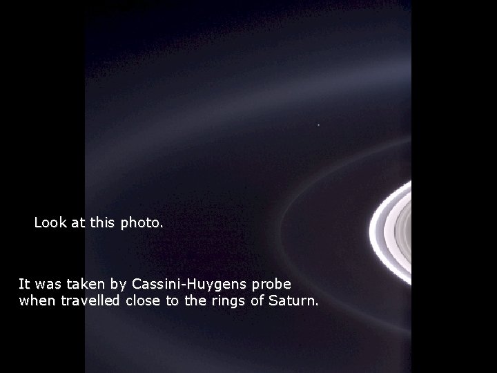 Héla aquí, pues: Look at this photo. It was taken by Cassini-Huygens probe when