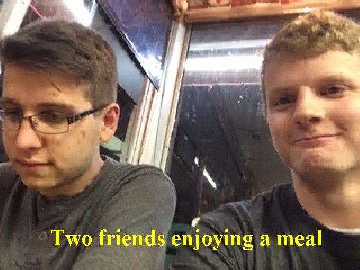 Two friends enjoying a meal 