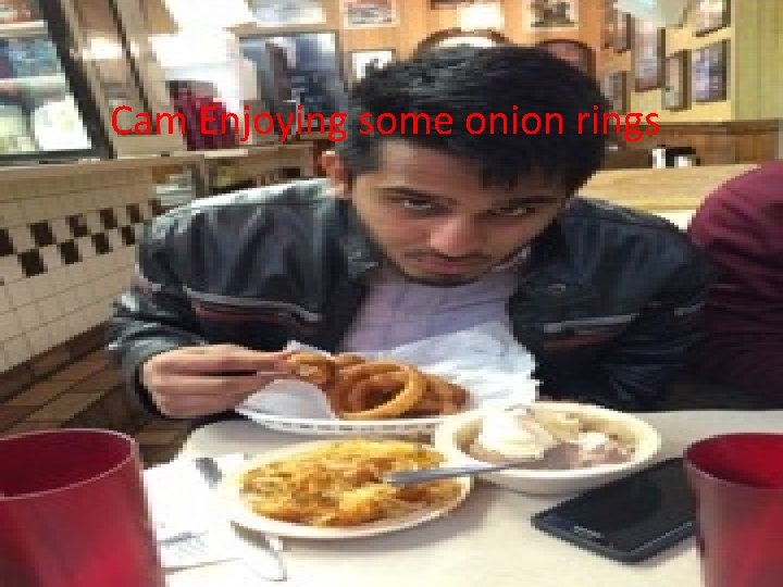 Cam Enjoying some onion rings 