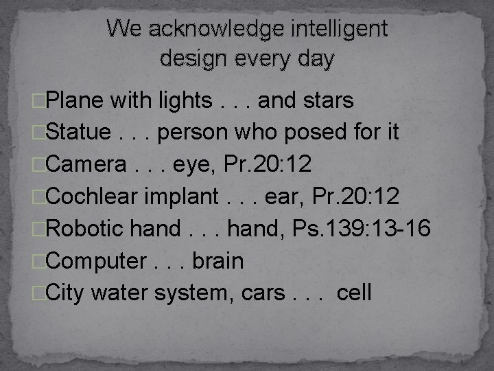 We acknowledge intelligent design every day �Plane with lights. . . and stars �Statue.