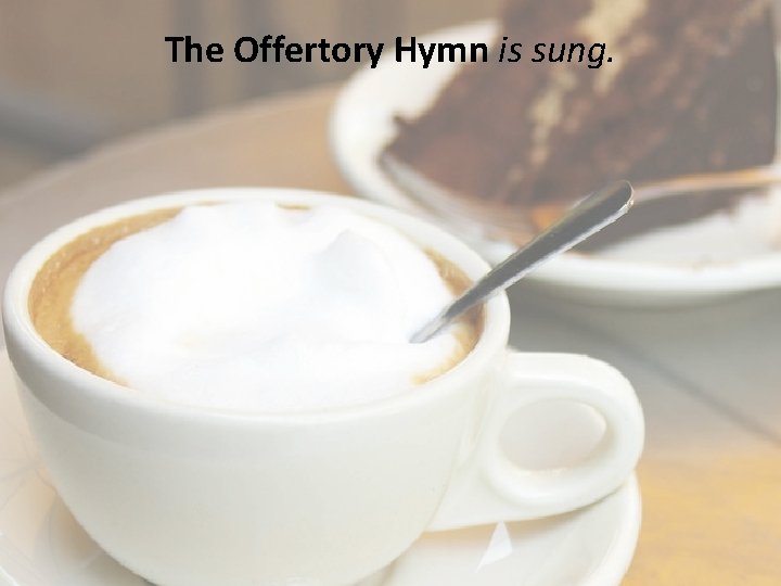 The Offertory Hymn is sung. 