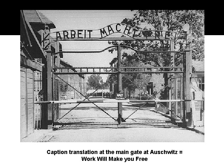 Caption translation at the main gate at Auschwitz = Work Will Make you Free