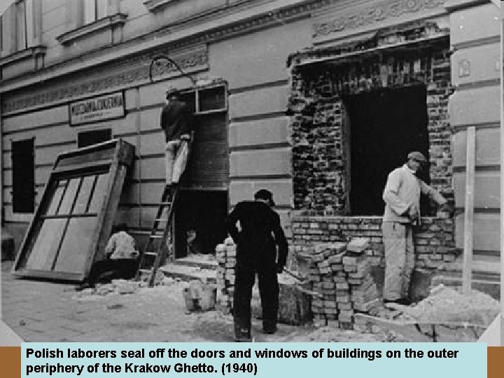 Polish laborers seal off the doors and windows of buildings on the outer periphery