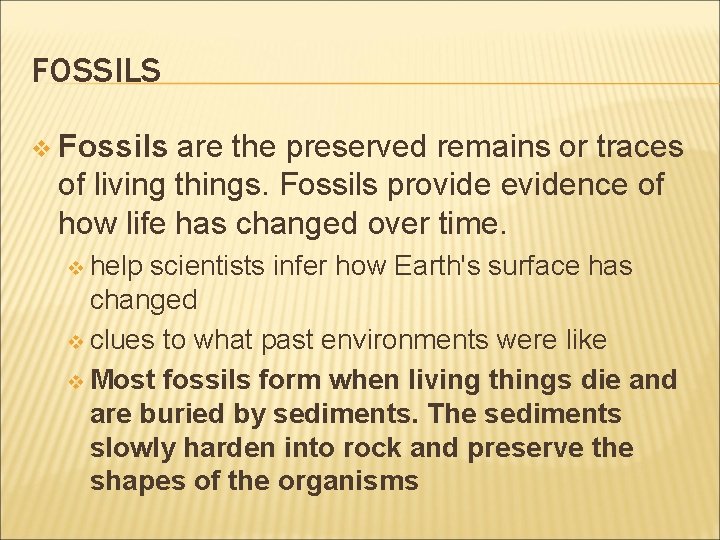 FOSSILS v Fossils are the preserved remains or traces of living things. Fossils provide