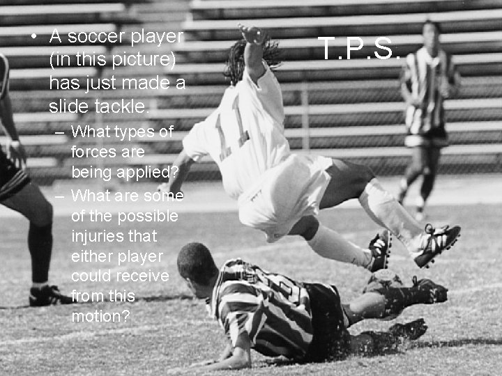  • A soccer player (in this picture) has just made a slide tackle.