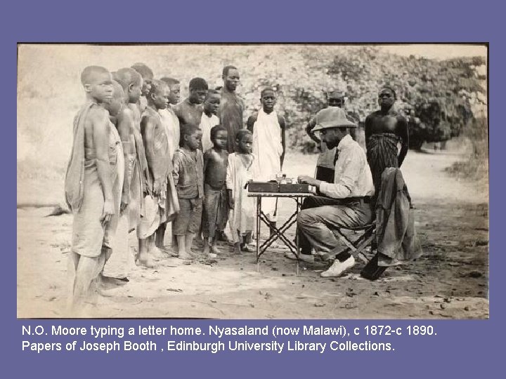 N. O. Moore typing a letter home. Nyasaland (now Malawi), c 1872 -c 1890.