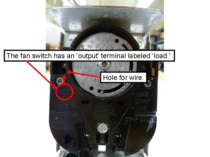 The fan switch has an ‘output’ terminal labeled ‘load. ’ Hole for wire. 