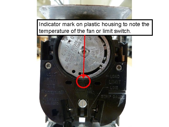 Indicator mark on plastic housing to note the temperature of the fan or limit