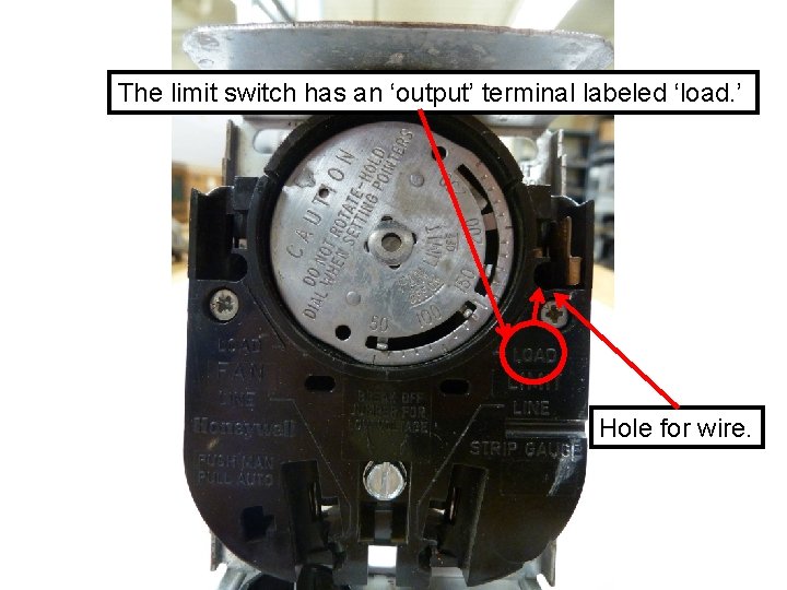 The limit switch has an ‘output’ terminal labeled ‘load. ’ Hole for wire. 