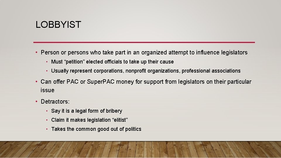 LOBBYIST • Person or persons who take part in an organized attempt to influence