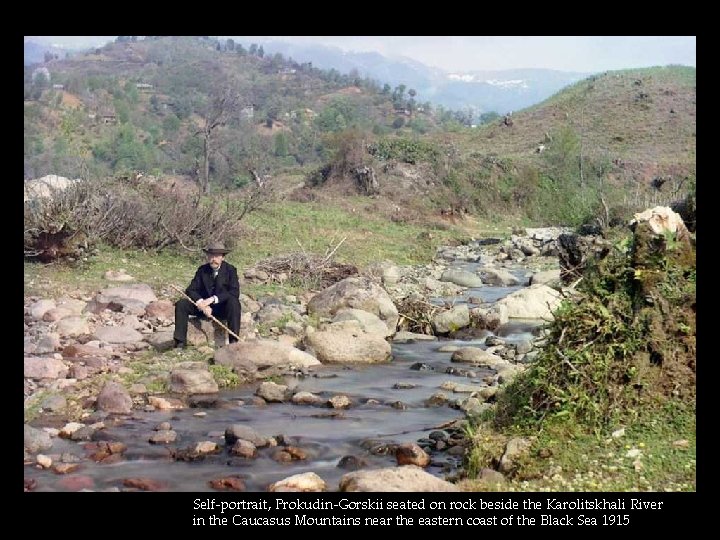 Self-portrait, Prokudin-Gorskii seated on rock beside the Karolitskhali River in the Caucasus Mountains near