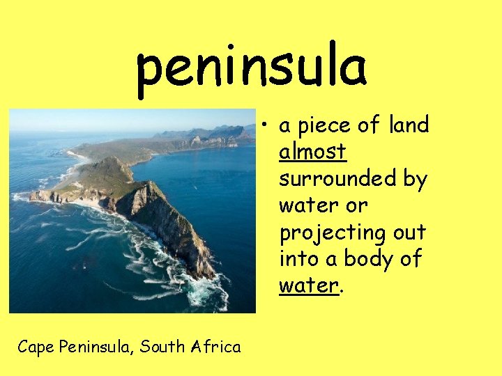 peninsula • a piece of land almost surrounded by water or projecting out into