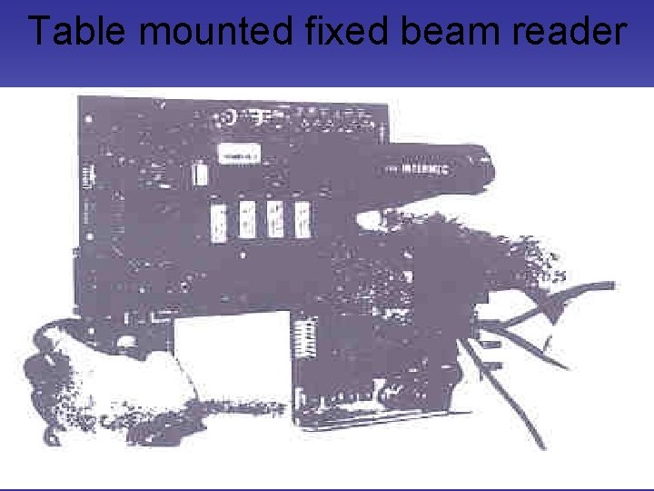 Table mounted fixed beam reader 