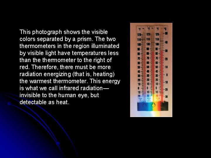 This photograph shows the visible colors separated by a prism. The two thermometers in