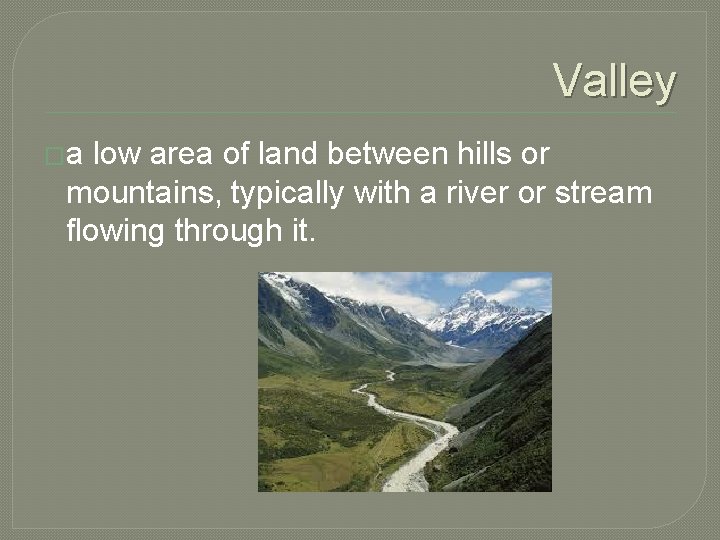 Valley �a low area of land between hills or mountains, typically with a river