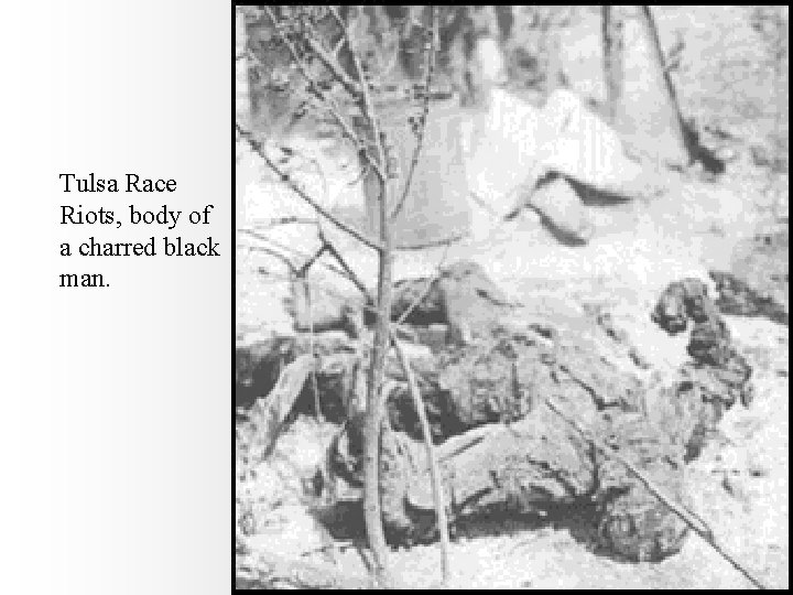 Tulsa Race Riots, body of a charred black man. 