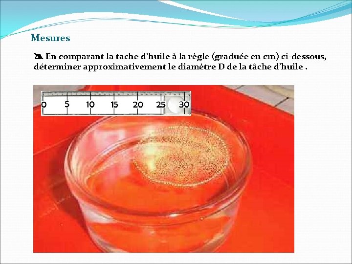 Mesures En comparant la tache d’huile à la règle (graduée en cm) ci-dessous, déterminer