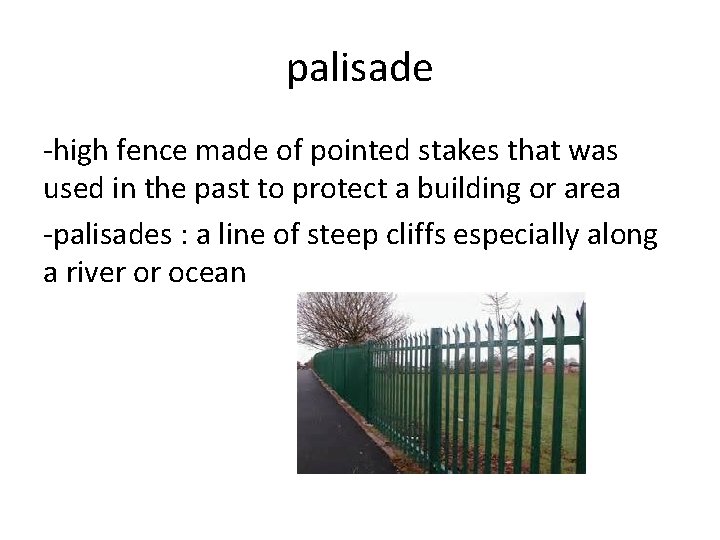 palisade -high fence made of pointed stakes that was used in the past to