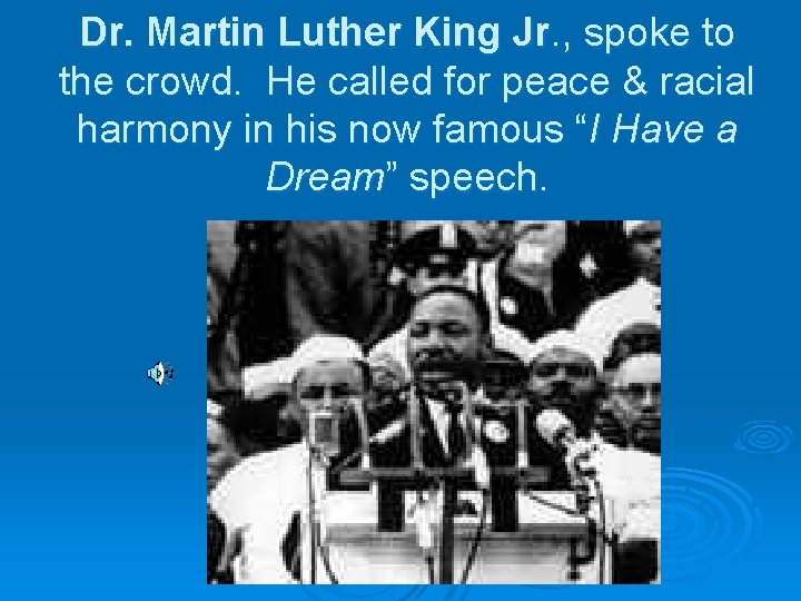 Dr. Martin Luther King Jr. , spoke to the crowd. He called for peace