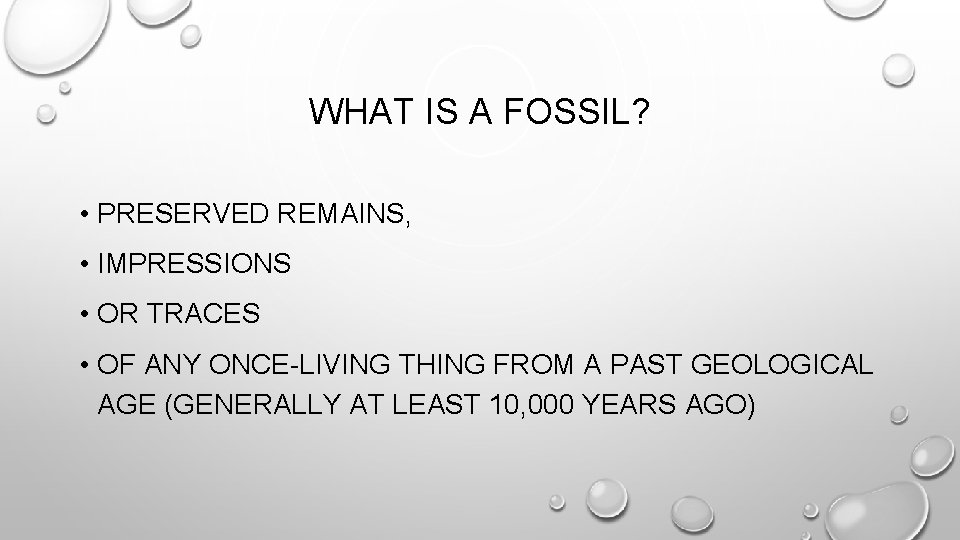 WHAT IS A FOSSIL? • PRESERVED REMAINS, • IMPRESSIONS • OR TRACES • OF