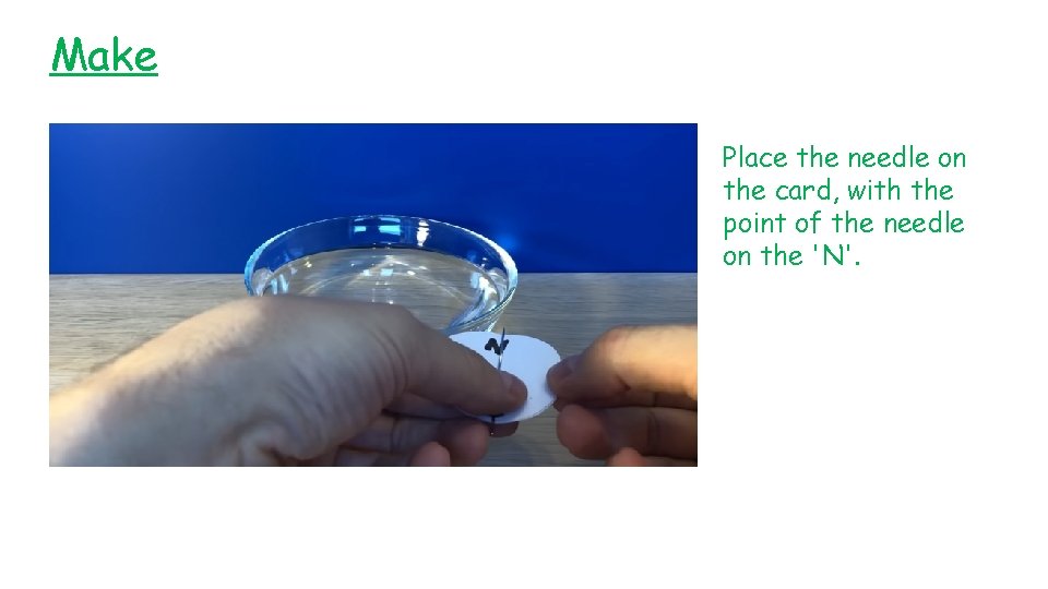 Make Place the needle on the card, with the point of the needle on