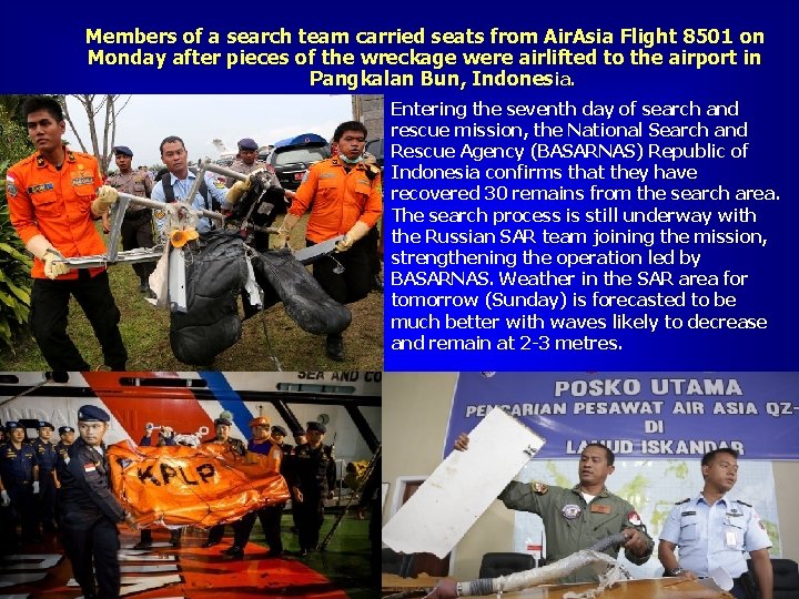Members of a search team carried seats from Air. Asia Flight 8501 on Monday