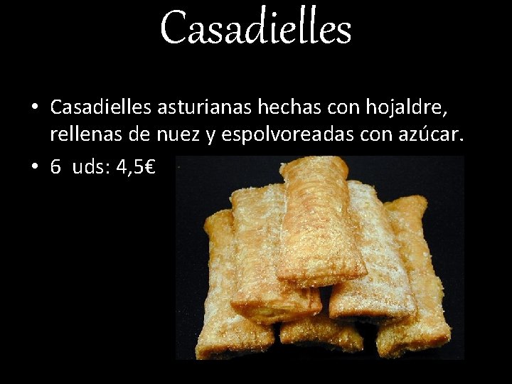 Casadielles • Casadielles asturianas hechas con hojaldre, rellenas de nuez y espolvoreadas con azúcar.