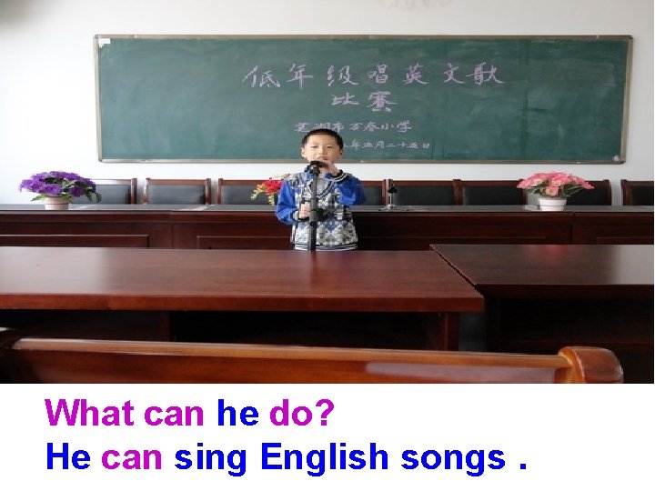 What can he do? He can sing English songs. 