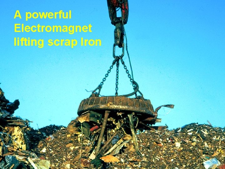 A powerful Electromagnet lifting scrap Iron 