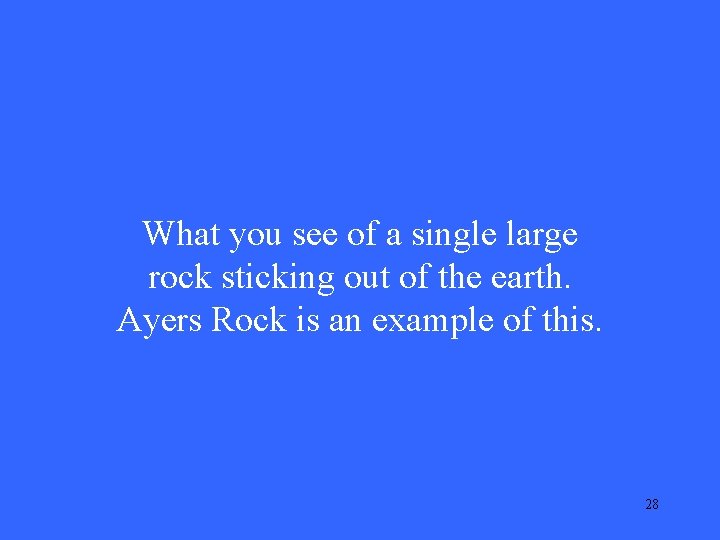 What you see of a single large rock sticking out of the earth. Ayers
