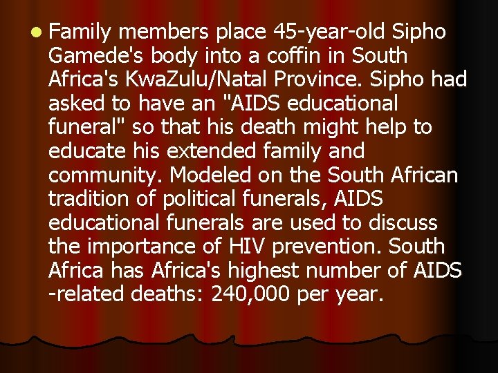 l Family members place 45 -year-old Sipho Gamede's body into a coffin in South