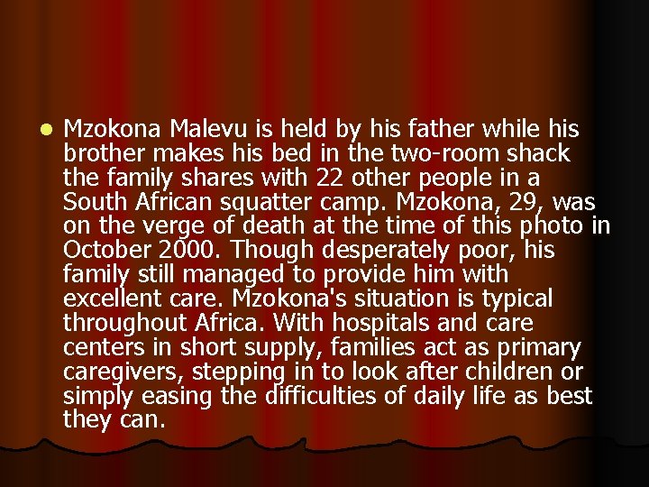 l Mzokona Malevu is held by his father while his brother makes his bed