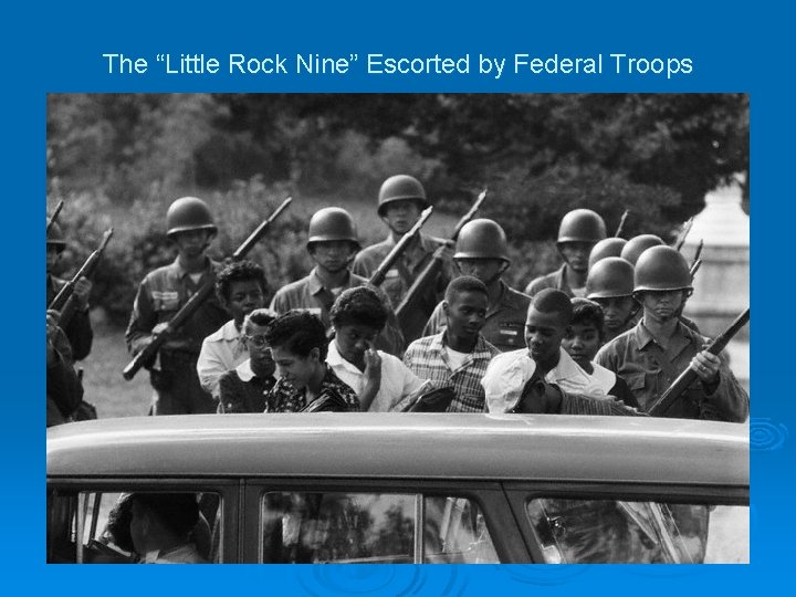 The “Little Rock Nine” Escorted by Federal Troops 
