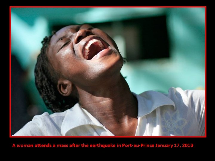 A woman attends a mass after the earthquake in Port-au-Prince January 17, 2010 