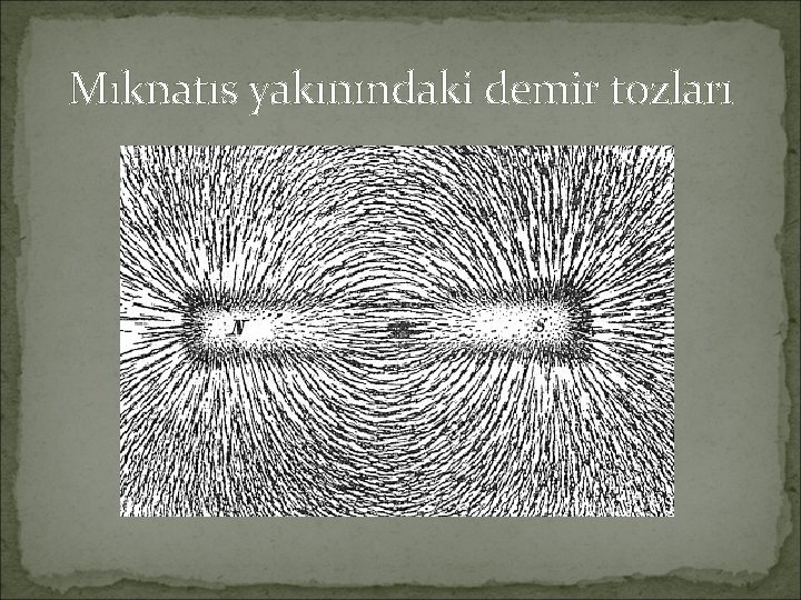 Mıknatıs yakınındaki demir tozları 