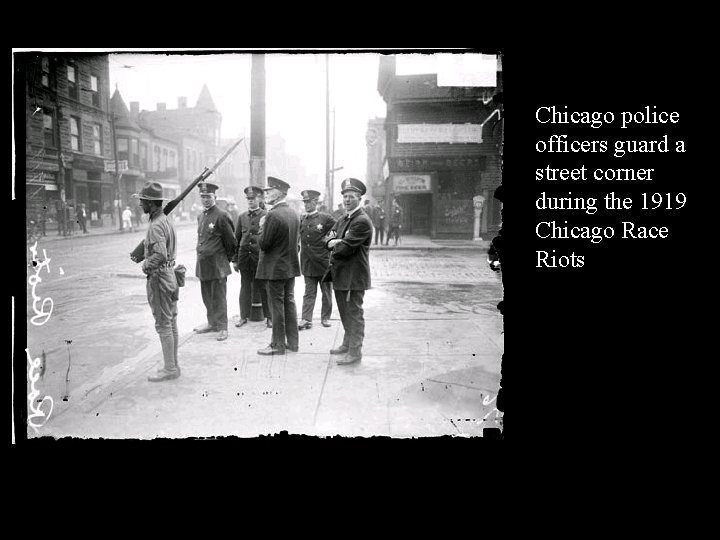 Chicago police officers guard a street corner during the 1919 Chicago Race Riots Chicago police officers guard a street corner during the 1919 Chicago Race Riots
