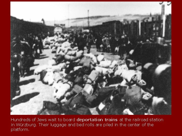 Hundreds of Jews wait to board deportation trains at the railroad station in Würzburg.