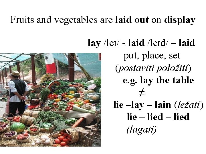 Fruits and vegetables are laid out on display /leɪ/ - laid /leɪd/ – laid